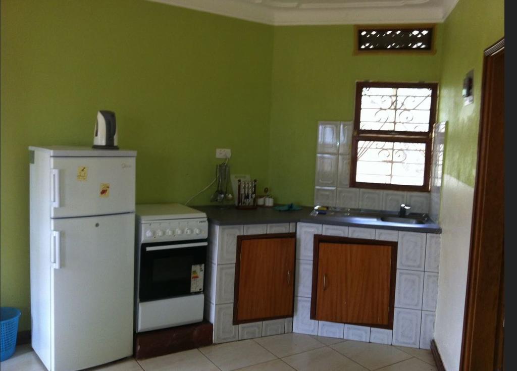 Prestige Resort Cottages Entebbe Bagian luar foto