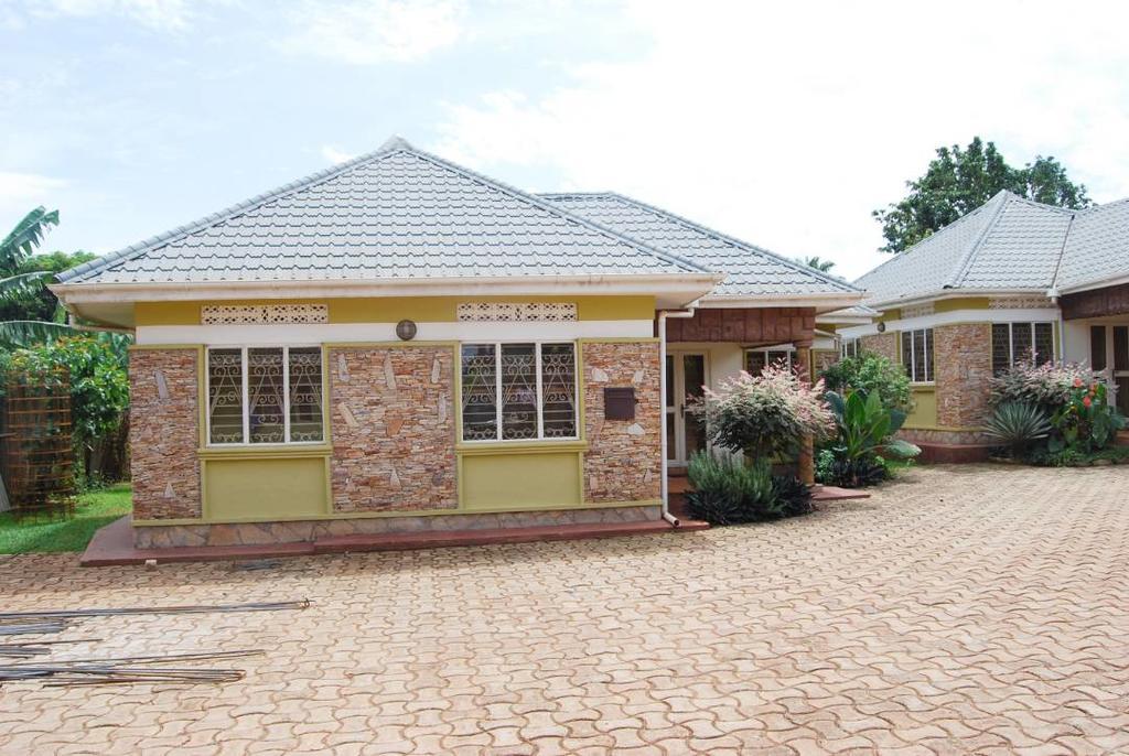 Prestige Resort Cottages Entebbe Bagian luar foto