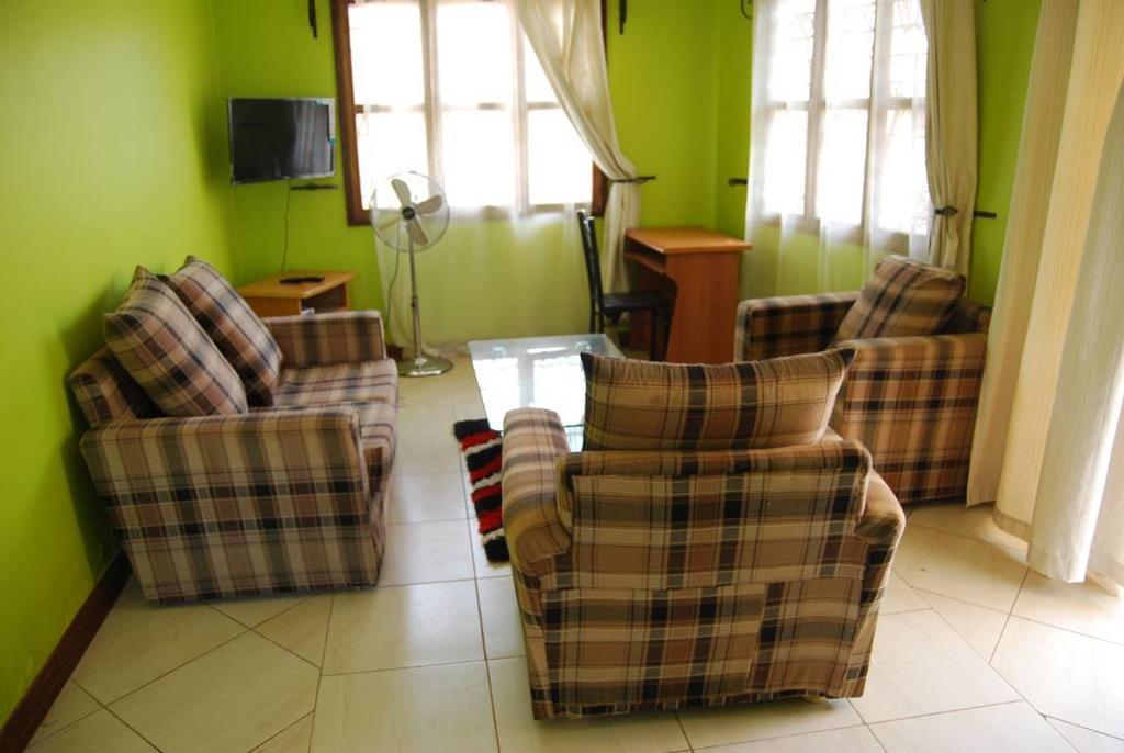 Prestige Resort Cottages Entebbe Bagian luar foto