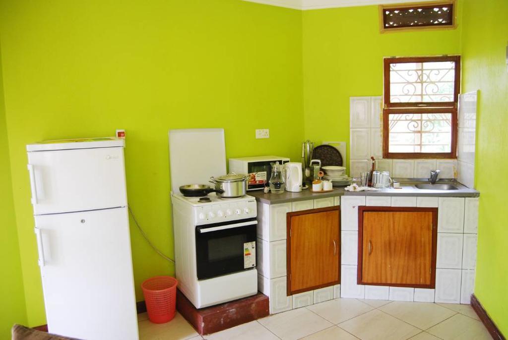 Prestige Resort Cottages Entebbe Bagian luar foto